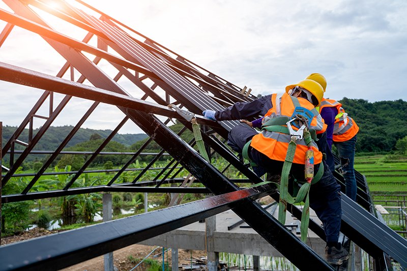 construction workers on a roof