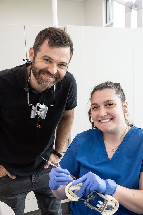 dental assistant with instructor