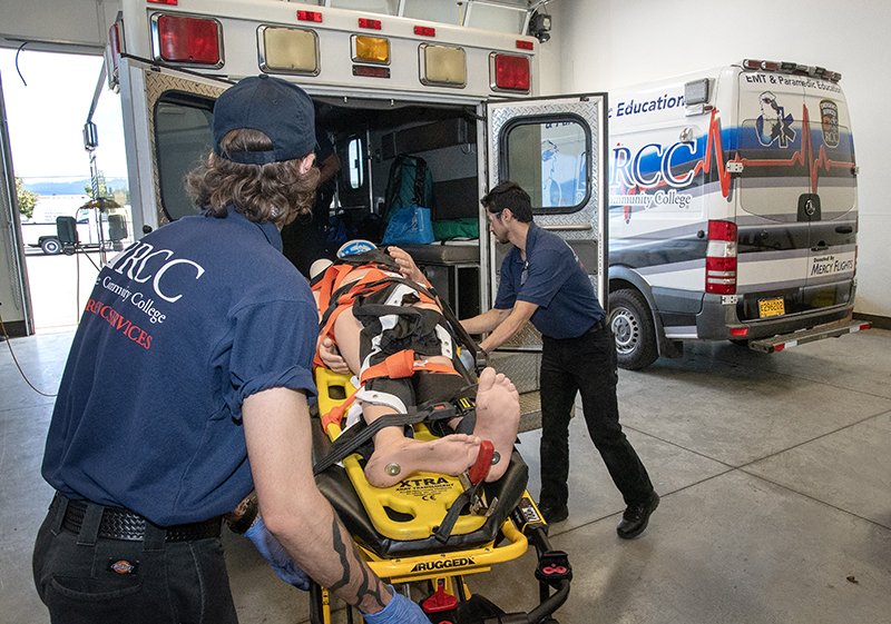 ems student with ambulance