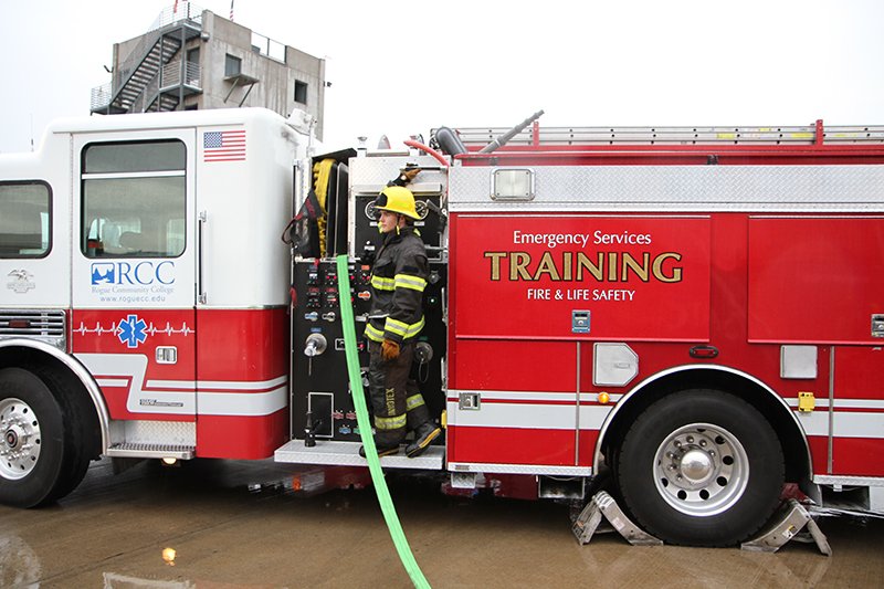 firefighter with fire truck