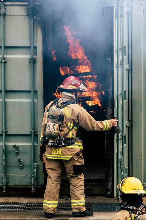 firefighter looking at fire