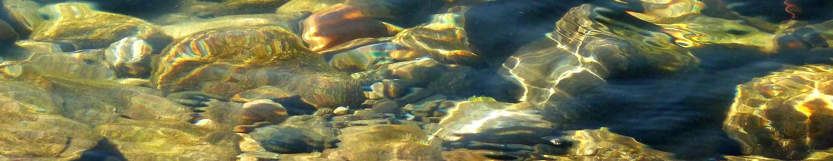 river rocks under water