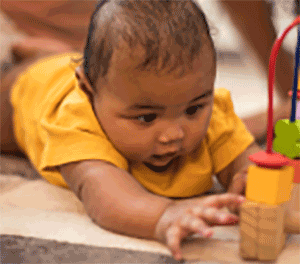 baby learning how to play