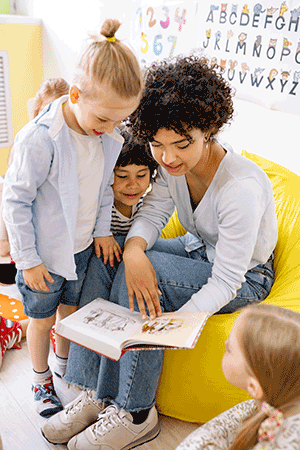 preschool environment teacher with students