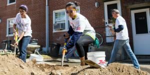 community service volunteers digging