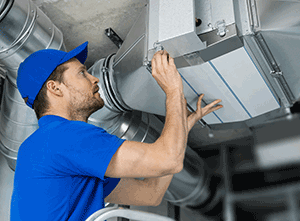 HVAC maintenance worker
