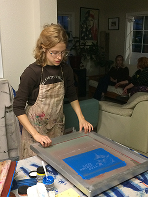 Bella with Rogue Climate working on screen print