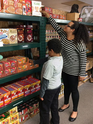volunteering with her son at the food pantry