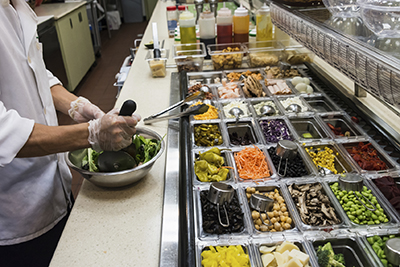 kitchen counter with food prepared in dishes